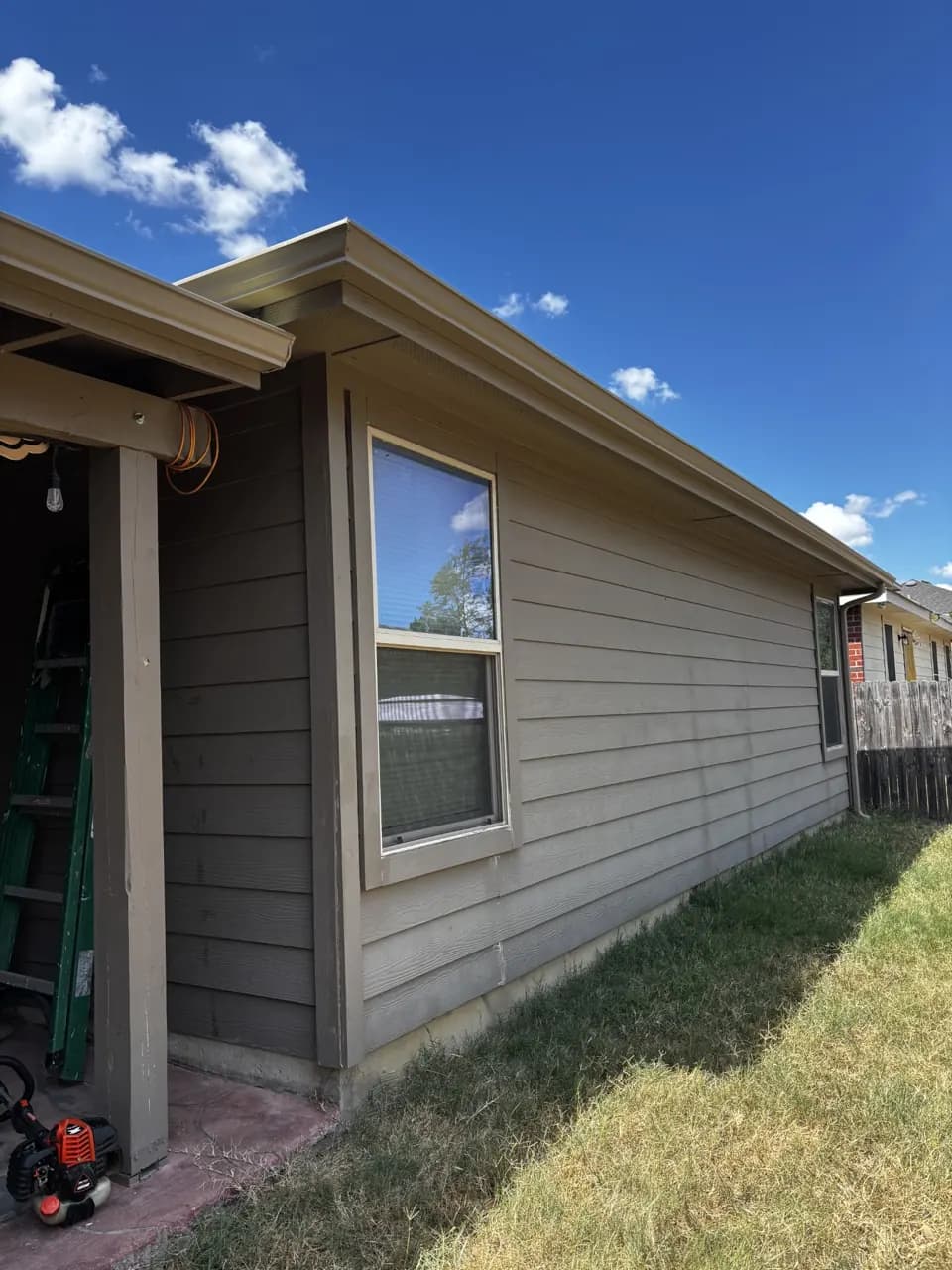 Gutter installation along siding and trim by Rugged American Exteriors