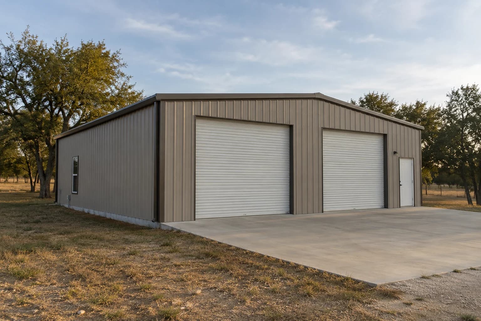Illustrative steel shop building with roll-up doors
